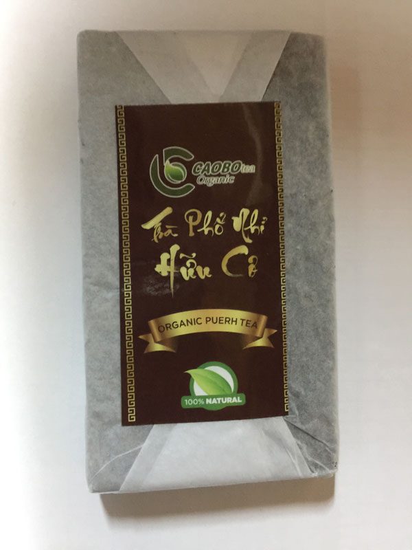 Trà Phổ Nhĩ hữu cơ bánh 250g (trà sống) - Cao Bo Organic Tea